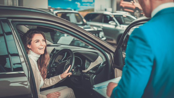 professional woman buying a car